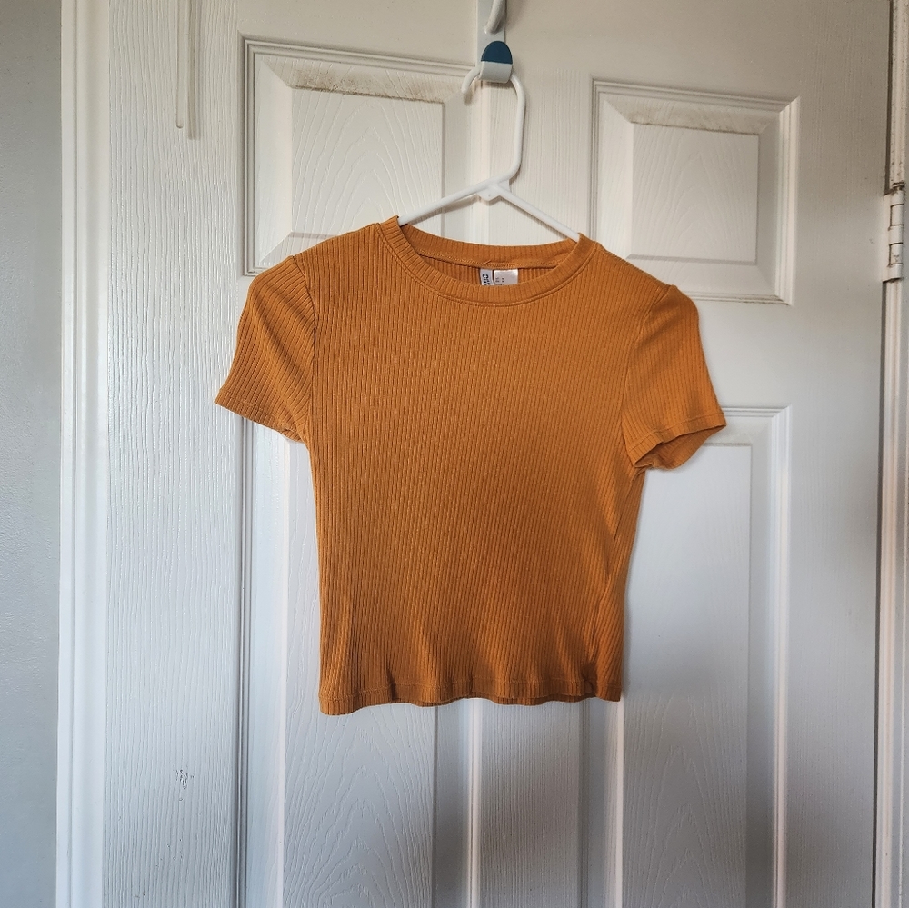 yellow-orange ribbed top
